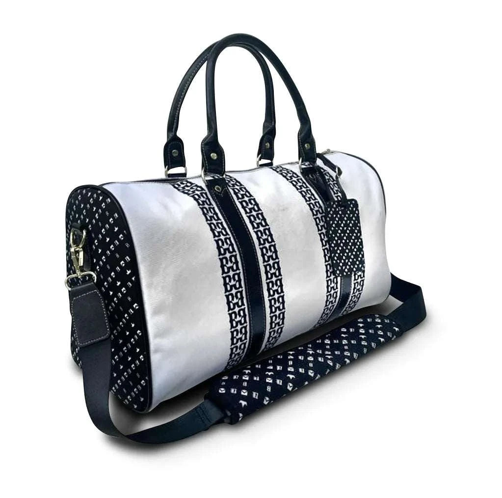 Black Lynx White A Gate Travel BagThe Black Lynx A Gate Travel Bag is the perfect companion for your next trip. This stylish bag is made from durable materials and features a sleek black and white deTravelbagsOriginalfbb Clothing co.Originalfbb Clothing CompanyBlack Lynx White